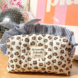 Trousse à maquillage matelassée à volant léopard et rayée